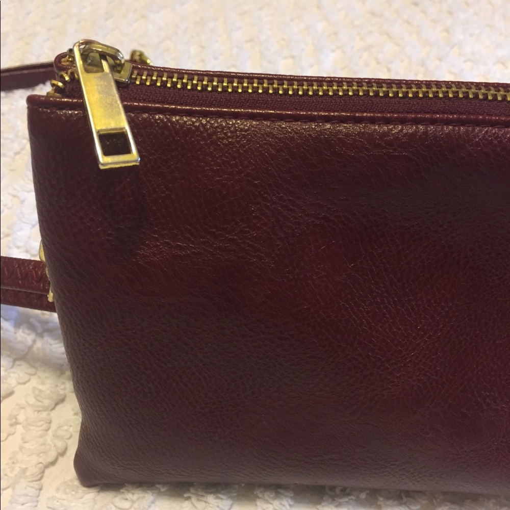 Deep maroon colored leather purse